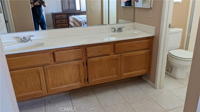 27297 Terrytown Rd, Menifee, CA 92586 - ensuite bathroom featuring tile patterned floors and double vanity