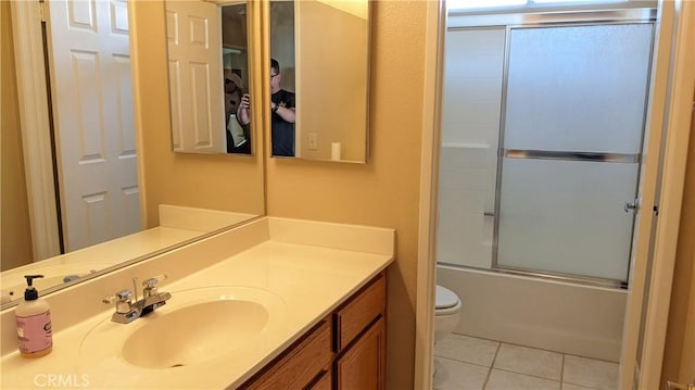 27297 Terrytown Rd, Menifee, CA 92586 - bathroom featuring tile patterned flooring, vanity, and enclosed tub / shower combo
