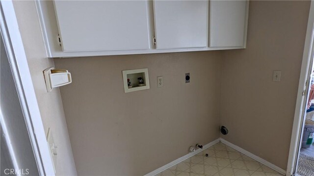 27297 Terrytown Rd, Menifee, CA 92586 - laundry area featuring washer hookup, hookup for a gas dryer, electric dryer hookup, and cabinet space