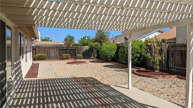 27297 Terrytown Rd, Menifee, CA 92586 - fenced backyard featuring a patio area and a pergola