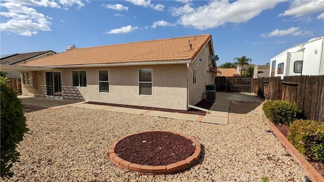 27297 Terrytown Rd, Menifee, CA 92586 - rear view of property featuring a tile roof, a patio, and stucco siding