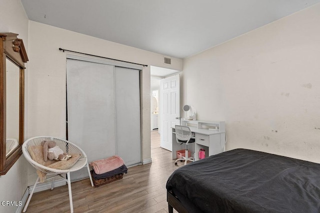 2540 El Dorado Ave Unit A, Oxnard, CA 93033 - bedroom with wood finished floors and a closet