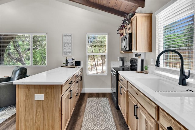 2583 Oak Shores Dr, Bradley, CA 93426 - kitchen with black microwave, range with electric cooktop, dark wood-style flooring, a peninsula, and light brown cabinets