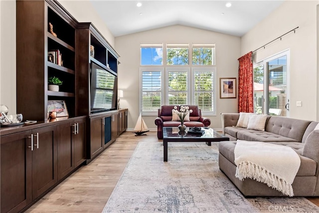 138 Listo St, Rancho Mission Viejo, CA 92694 - living room with light wood-type flooring and lofted ceiling