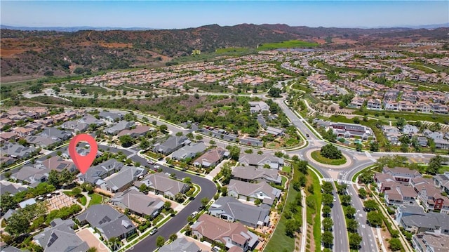 138 Listo St, Rancho Mission Viejo, CA 92694 - aerial view of property and surrounding area with nearby suburban area and a mountainous background