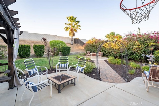 20642 Iris Canyon Rd, Riverside, CA 92508 - fenced backyard with an outdoor fire pit and a patio