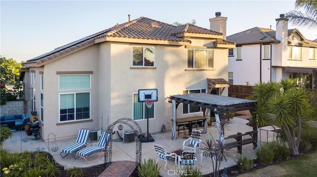 20642 Iris Canyon Rd, Riverside, CA 92508 - back of house with stucco siding, a tile roof, and a patio area