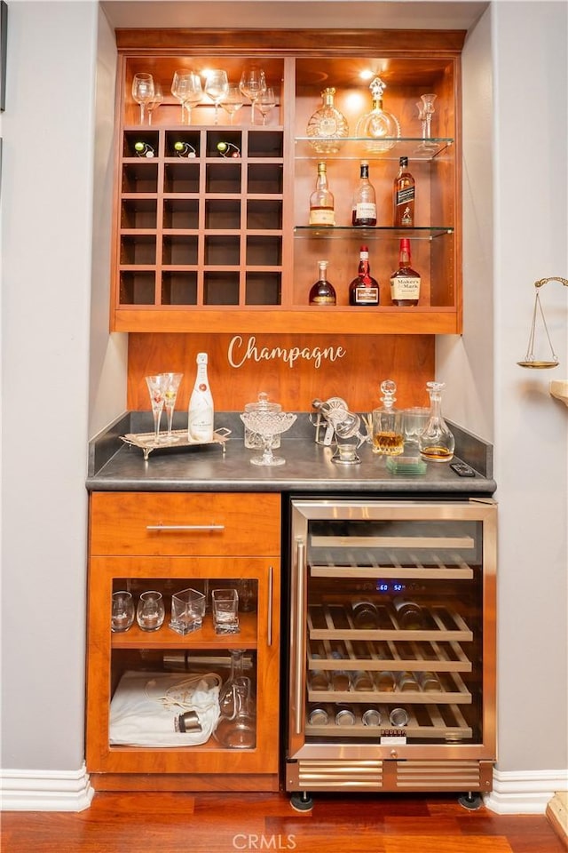 20642 Iris Canyon Rd, Riverside, CA 92508 - indoor dry bar featuring beverage cooler and wood finished floors
