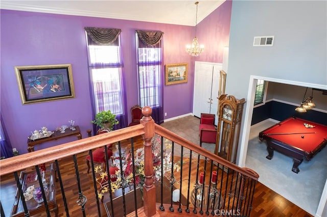 20642 Iris Canyon Rd, Riverside, CA 92508 - stairway with a chandelier, ornamental molding, and wood finished floors