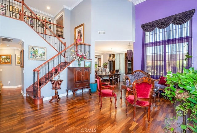 20642 Iris Canyon Rd, Riverside, CA 92508 - interior space with a towering ceiling, wood finished floors, stairway, and crown molding