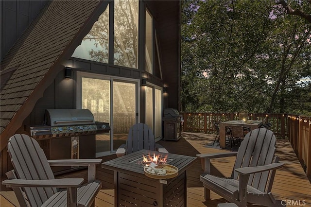 1296 Calgary Dr, Lake Arrowhead, CA 92352 - deck with outdoor dining area, grilling area, and a fire pit