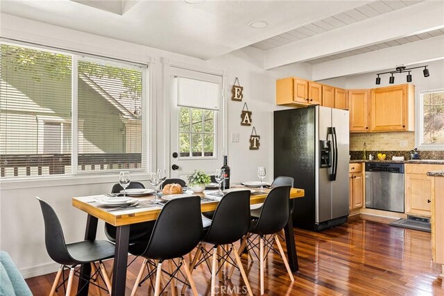 1296 Calgary Dr, Lake Arrowhead, CA 92352 - dining area featuring healthy amount of natural light, dark wood-style flooring, and beam ceiling