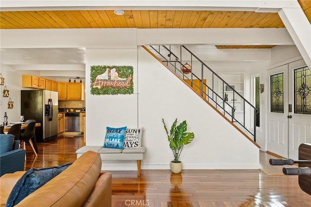 1296 Calgary Dr, Lake Arrowhead, CA 92352 - living room featuring stairway, dark wood-style floors, and a wood ceiling with exposed beams