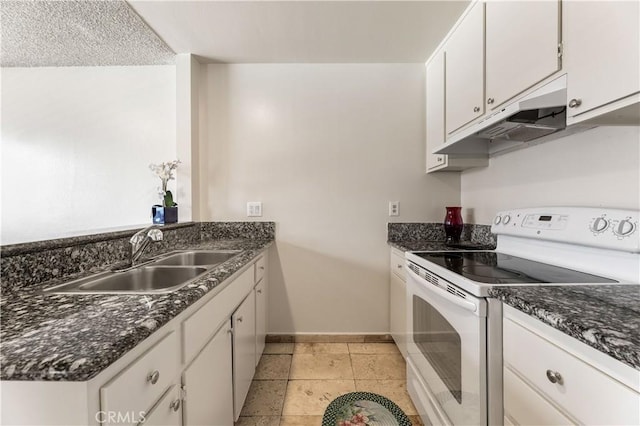 5530 Ackerfield Ave Unit 206, Long Beach, CA 90805 - kitchen with white range with electric cooktop, under cabinet range hood, white cabinetry, and dark stone countertops