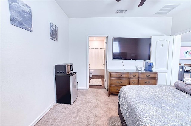 4262 Theresa Ln, Merced, CA 95348 - bedroom featuring light carpet, ensuite bath, and ceiling fan