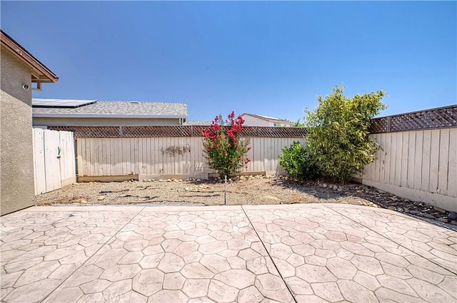 4262 Theresa Ln, Merced, CA 95348 - fenced backyard with a patio
