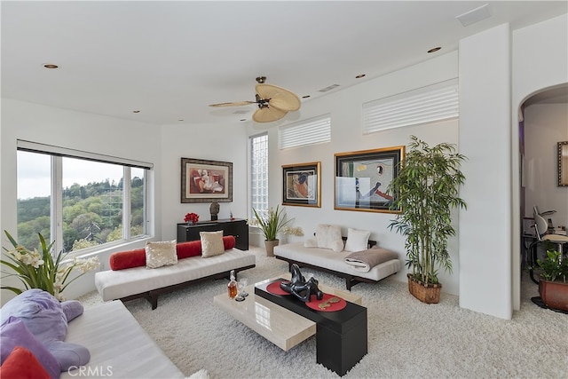 28527 Willow Rd, Lake Arrowhead, CA 92385 - living room with a ceiling fan, arched walkways, carpet, and recessed lighting