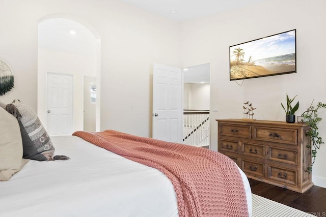 737 W Bel Esprit Cir, San Marcos, CA 92069 - bedroom featuring dark wood-type flooring and arched walkways