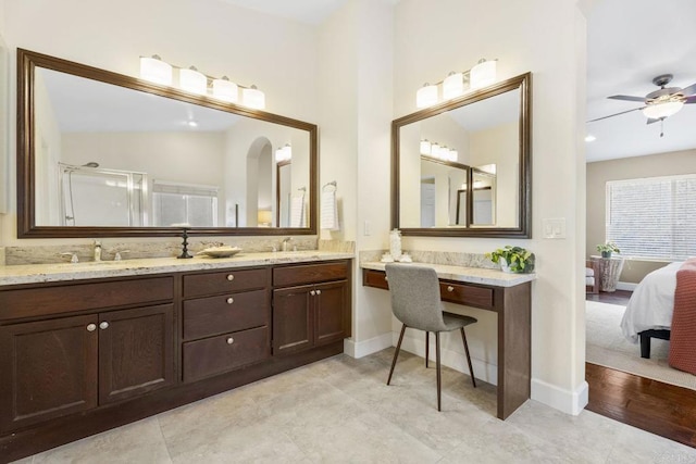 737 W Bel Esprit Cir, San Marcos, CA 92069 - ensuite bathroom featuring double vanity, an enclosed shower, and a ceiling fan