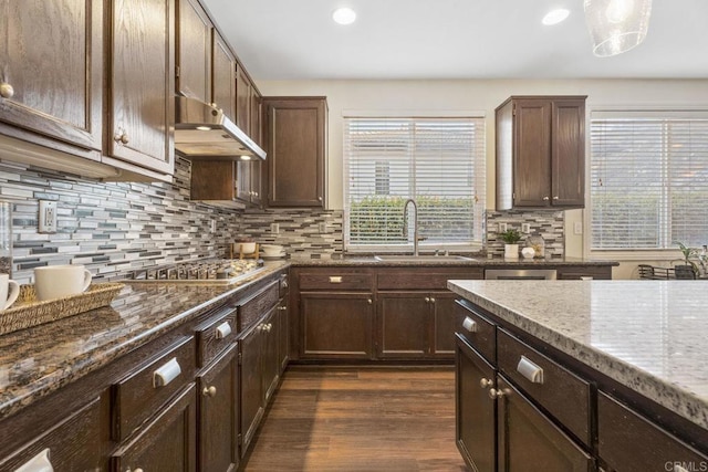 737 W Bel Esprit Cir, San Marcos, CA 92069 - kitchen with stainless steel gas cooktop, dark wood-style floors, backsplash, dark stone countertops, and recessed lighting