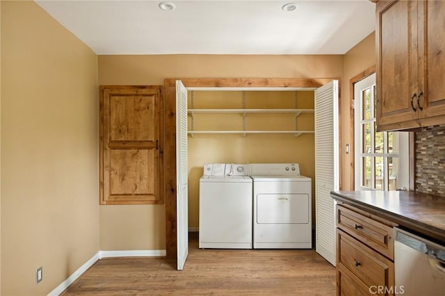 33159 Ridge Rd, Arrowbear, CA 92308 - laundry area featuring independent washer and dryer and light wood-style floors