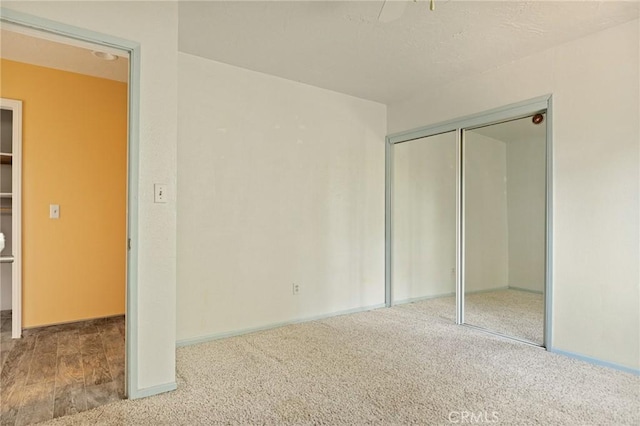 33159 Ridge Rd, Arrowbear, CA 92308 - unfurnished bedroom featuring carpet floors and a closet