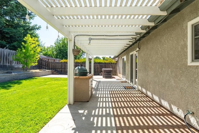 836 Bolen Dr, Paso Robles, CA 93446 - fenced backyard featuring grilling area, a pergola, and a patio