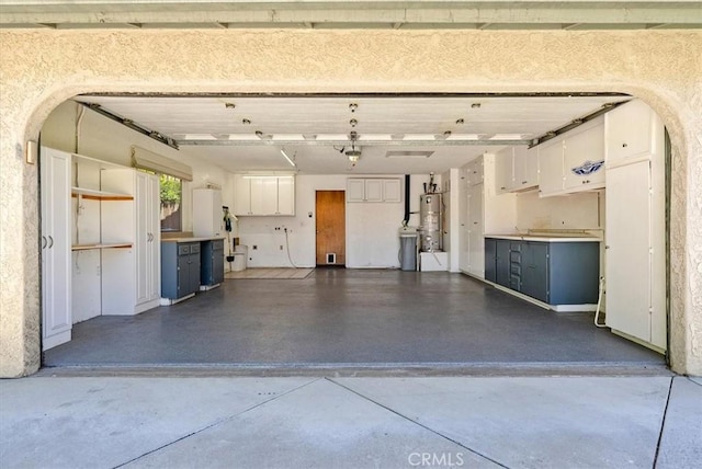 836 Bolen Dr, Paso Robles, CA 93446 - garage with strapped water heater