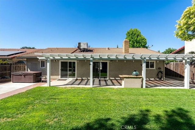 836 Bolen Dr, Paso Robles, CA 93446 - back of house featuring a hot tub, a pergola, a patio area, and a tiled roof