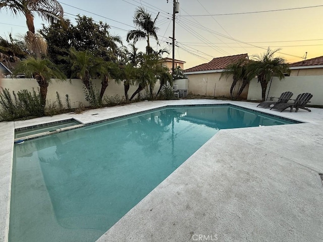 1016 W Teresa St, West Covina, CA 91790 - view of pool with a fenced backyard, a patio, and a pool with connected hot tub