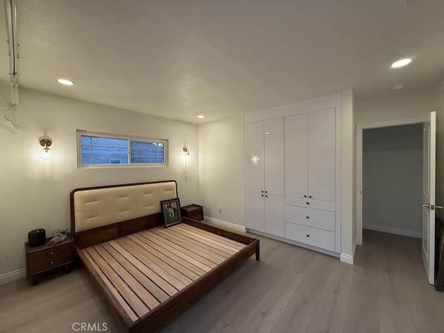 1016 W Teresa St, West Covina, CA 91790 - bedroom featuring light wood-style floors, recessed lighting, and a closet