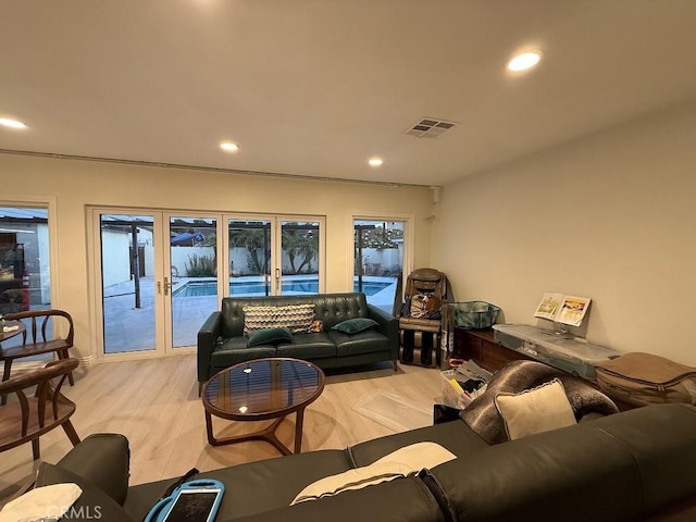 1016 W Teresa St, West Covina, CA 91790 - living room with recessed lighting and light wood finished floors