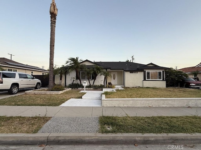 1016 W Teresa St, West Covina, CA 91790 - ranch-style home with a front yard and stucco siding