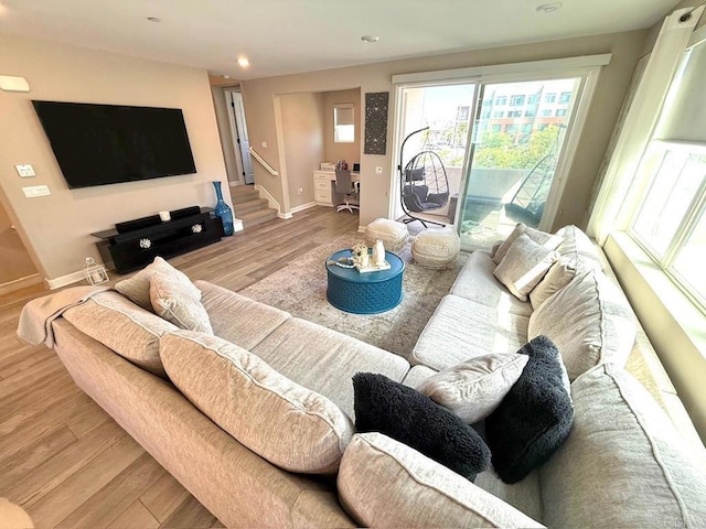 1959 Minimalist Ln, Chula Vista, CA 91915 - living room with wood finished floors, stairs, and recessed lighting