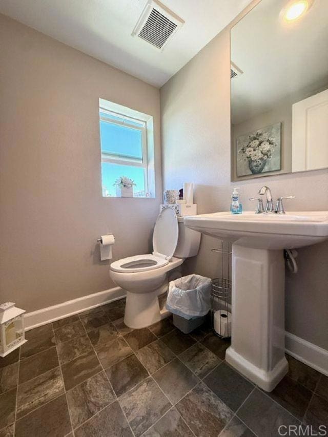 1959 Minimalist Ln, Chula Vista, CA 91915 - bathroom featuring toilet and baseboards