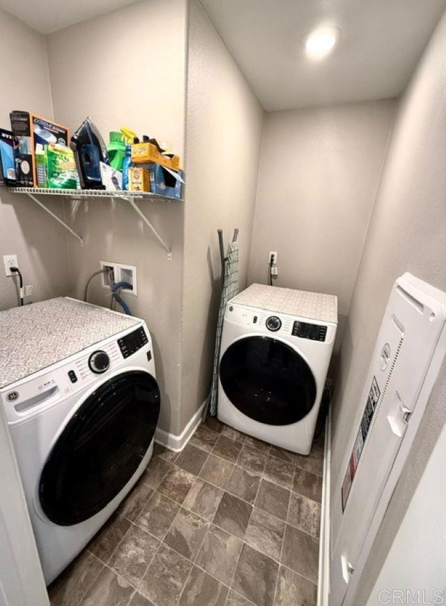 1959 Minimalist Ln, Chula Vista, CA 91915 - washroom featuring washer and clothes dryer and baseboards