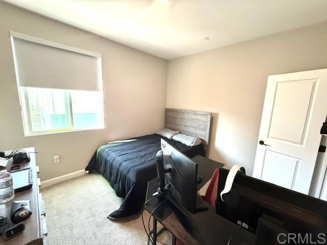 1959 Minimalist Ln, Chula Vista, CA 91915 - bedroom featuring carpet flooring and baseboards