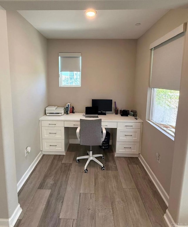1959 Minimalist Ln, Chula Vista, CA 91915 - home office featuring built in desk, dark wood finished floors, and recessed lighting