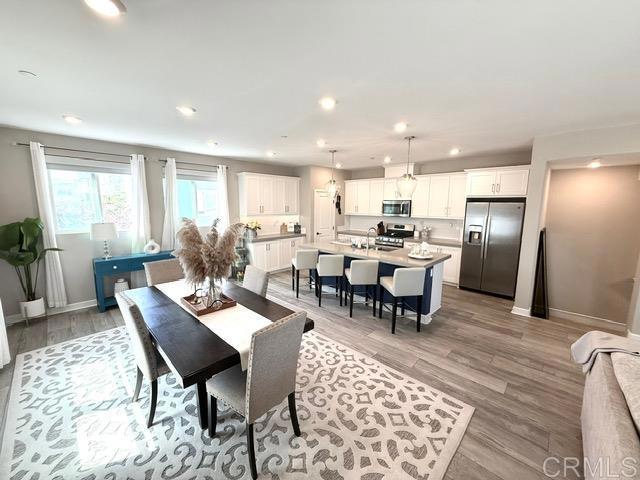 1959 Minimalist Ln, Chula Vista, CA 91915 - dining area featuring recessed lighting and light wood finished floors
