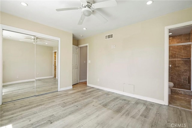 10265 Lev Ave, Arleta, CA 91331 - unfurnished bedroom with wood finished floors, a closet, recessed lighting, connected bathroom, and ceiling fan