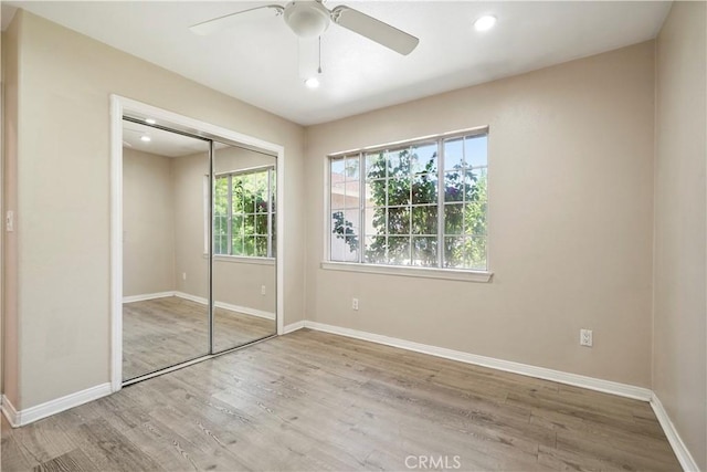 10265 Lev Ave, Arleta, CA 91331 - unfurnished bedroom featuring wood finished floors, a closet, recessed lighting, and a ceiling fan