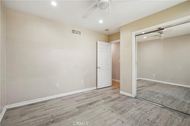 10265 Lev Ave, Arleta, CA 91331 - unfurnished bedroom with wood finished floors, recessed lighting, a closet, and a ceiling fan