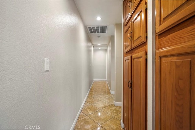 10265 Lev Ave, Arleta, CA 91331 - hall with light tile patterned floors, recessed lighting, and a textured wall