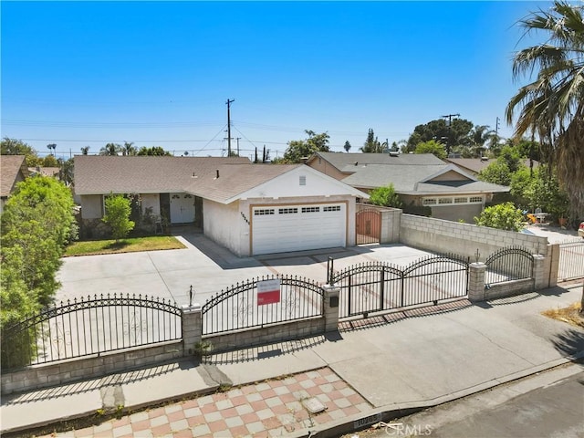 10265 Lev Ave, Arleta, CA 91331 - ranch-style home with concrete driveway, an attached garage, a fenced front yard, a gate, and stucco siding