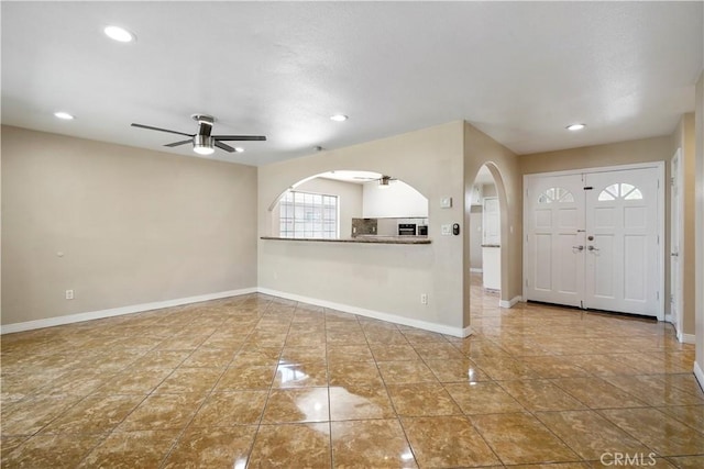 10265 Lev Ave, Arleta, CA 91331 - foyer entrance featuring a ceiling fan, arched walkways, and recessed lighting