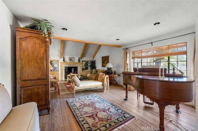 5250 Scott Robertson Rd, Hidden Hills, CA 91302 - sitting room with hardwood / wood-style flooring, a fireplace, and recessed lighting