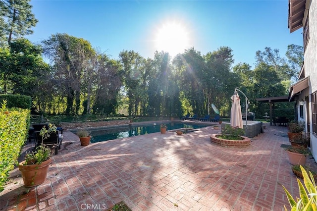 5250 Scott Robertson Rd, Hidden Hills, CA 91302 - swimming pool featuring a patio