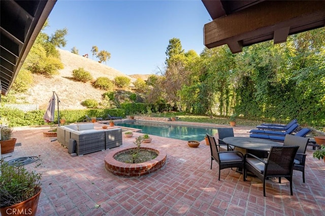 5250 Scott Robertson Rd, Hidden Hills, CA 91302 - outdoor pool with a patio area, outdoor lounge area, and outdoor dining space
