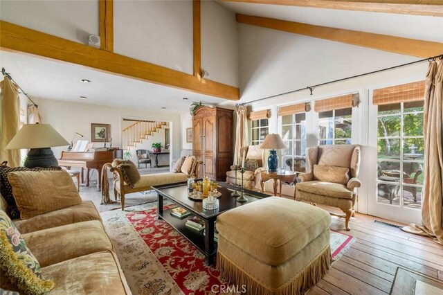 5250 Scott Robertson Rd, Hidden Hills, CA 91302 - living area featuring stairs, beam ceiling, high vaulted ceiling, and light wood-type flooring