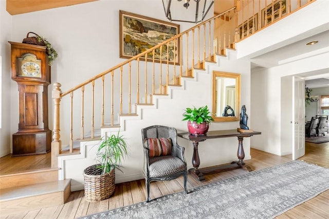 5250 Scott Robertson Rd, Hidden Hills, CA 91302 - stairway featuring wood finished floors and a high ceiling